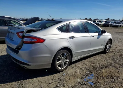 2016 Ford Fusion Titanium Phev z USA, uszkodzony, nr VIN 3FA6P0SU8GR357013